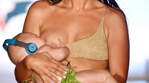 Model causes stir for breastfeeding while walking the ramp at Sports Illustrated fashion show